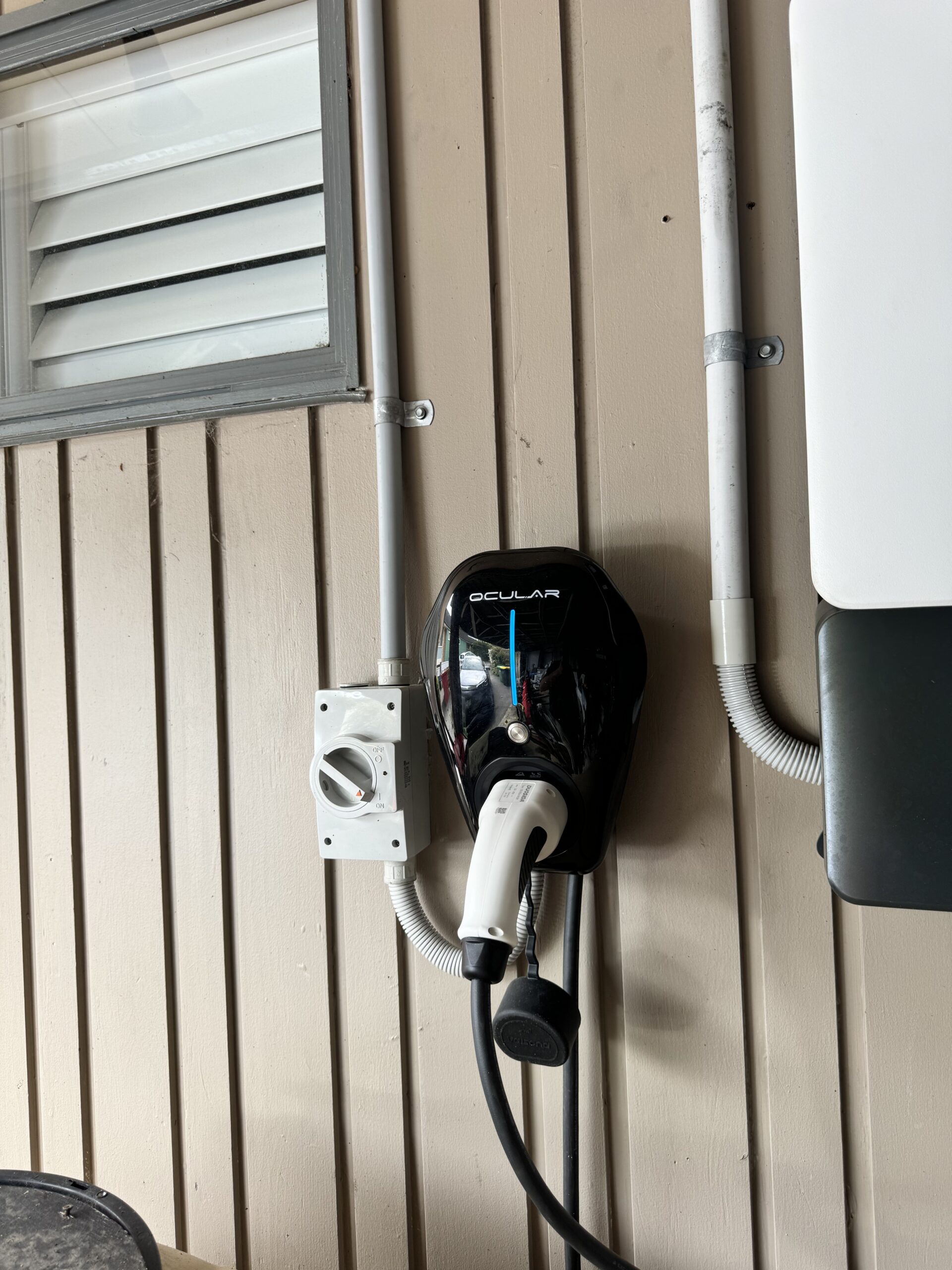 Ocular EV charger installation wall